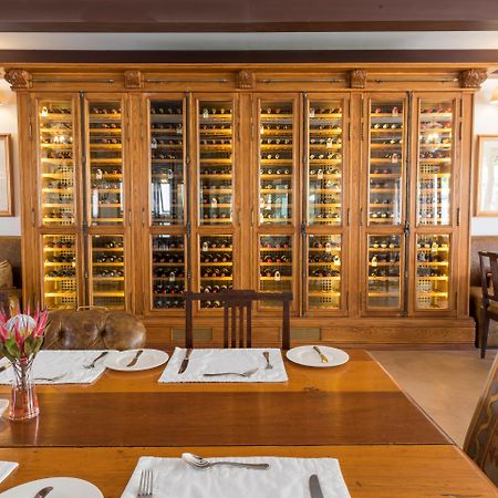 Drostdy Hotel Graaff-Reinet Eksteriør billede Wine rack at the restaurant
