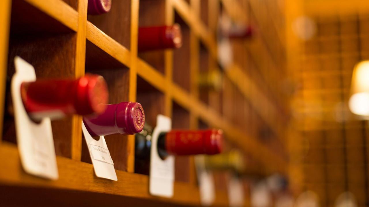 Drostdy Hotel Graaff-Reinet Eksteriør billede Wine bottles in a wine rack